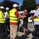 4 adults in safety gear receive instructions on how to use their Segways